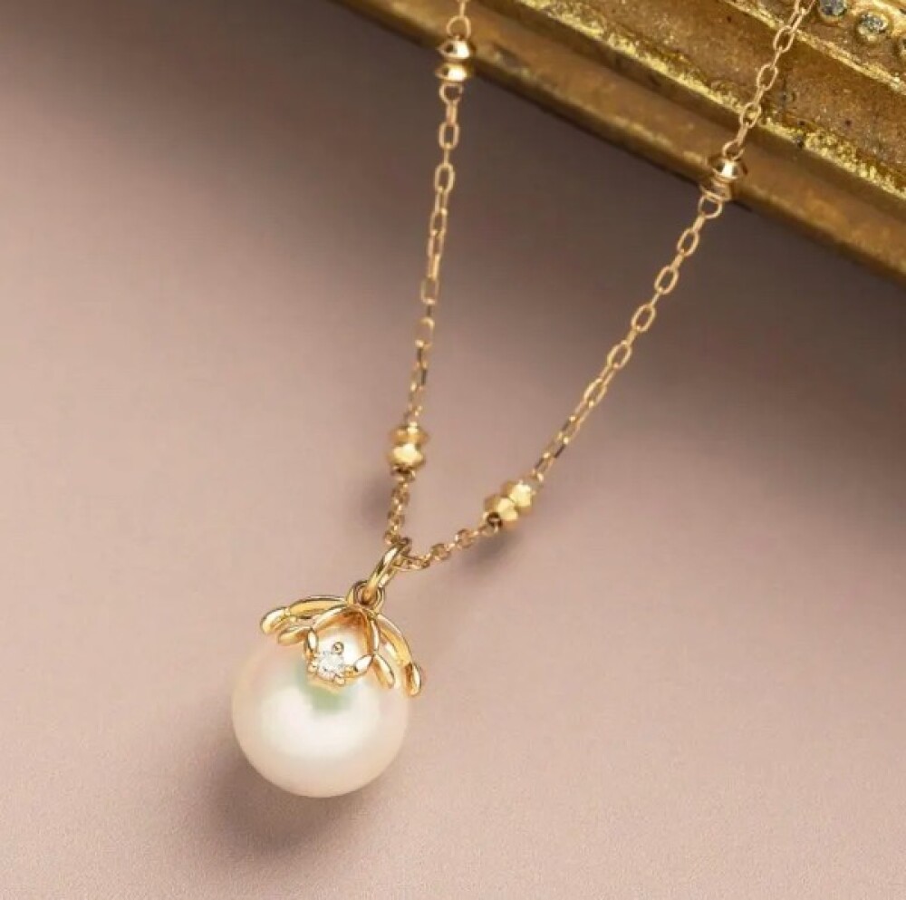 【テイクアップアップ】ヤドリギをモチーフにしたアコヤパールのセットアップ