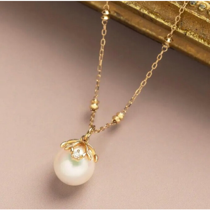 【テイクアップアップ】ヤドリギをモチーフにしたアコヤパールのセットアップ